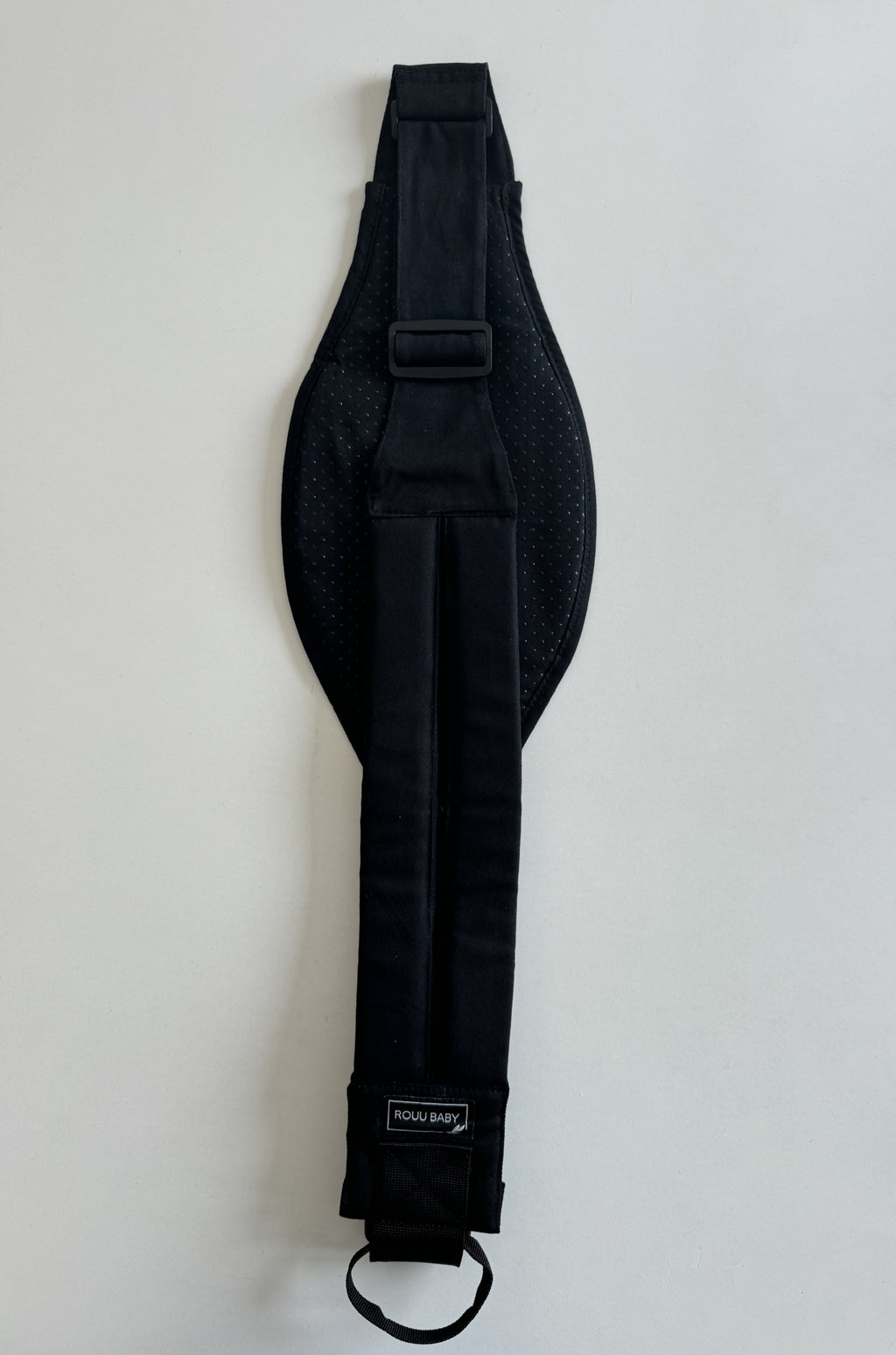 Back view of the Jet Black Rouu Baby II carrier showing the extendable back strap