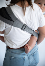 Rouu Baby II Lux Graphite Extendable wipeable hip carrier worn on the hip